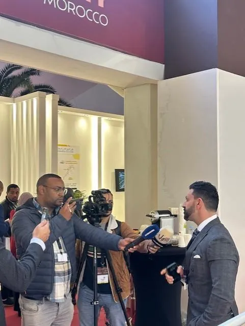Press and visitors at the JS GROUP booth in Marrakech